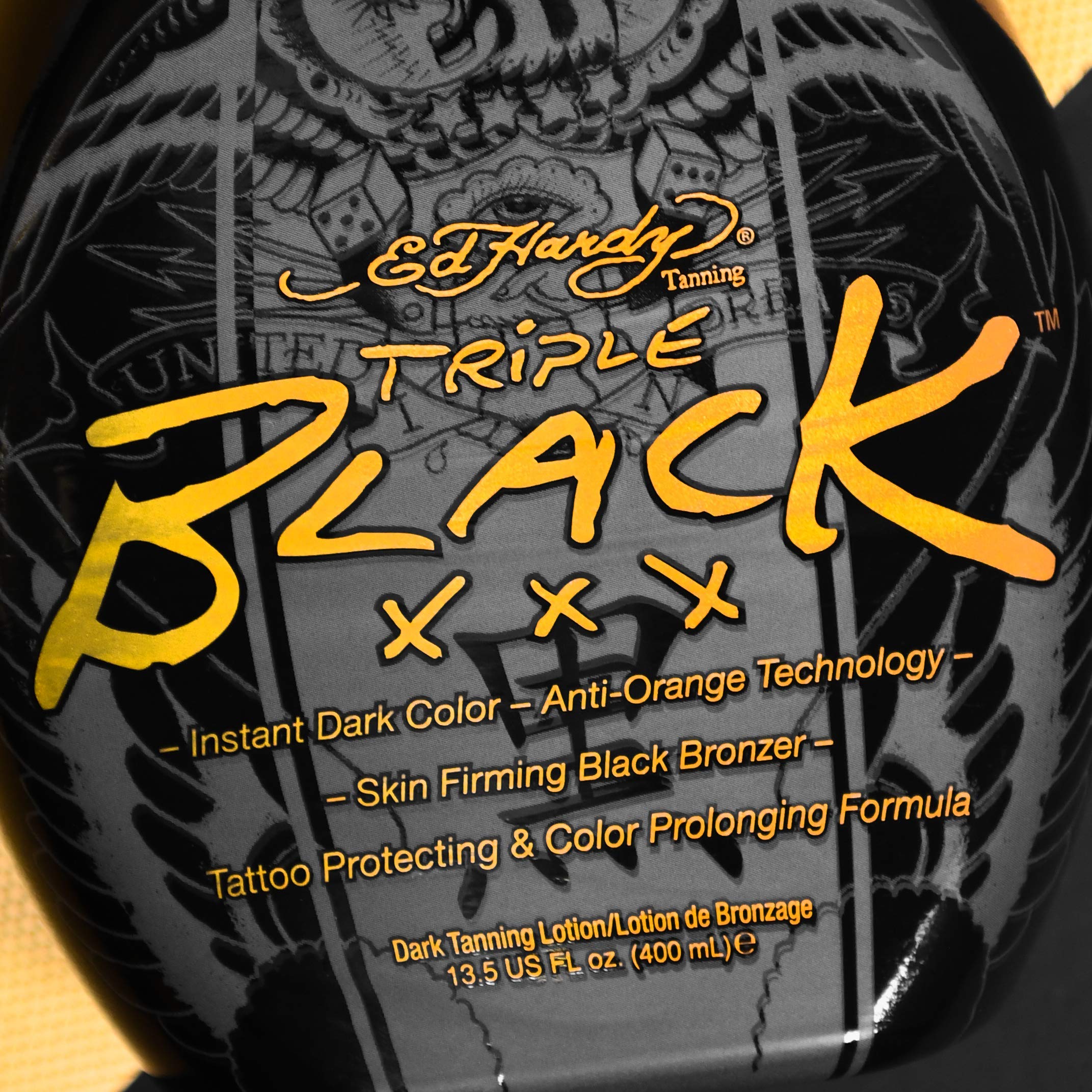 ED HARDY Black XXX tattoo protection concept image highlighting fade-resistant color