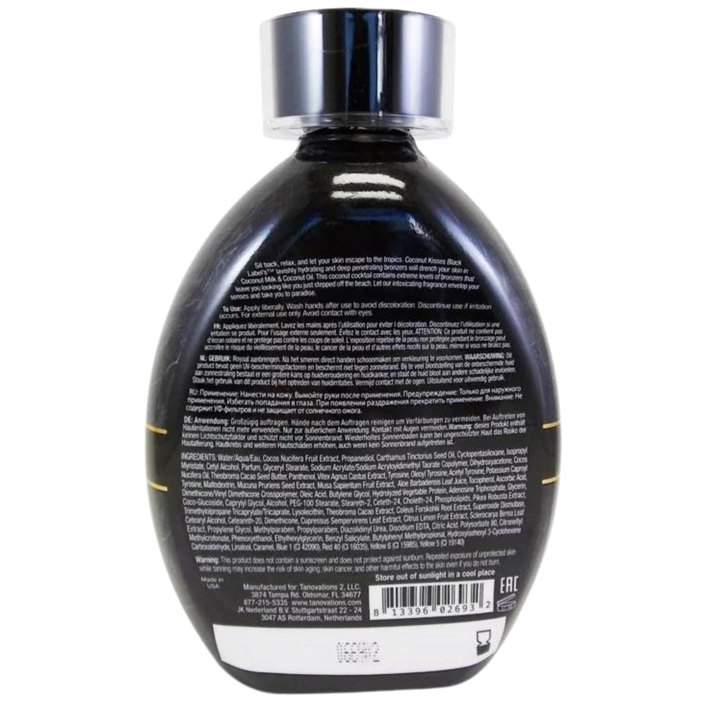 ED HARDY Coconut Kisses Black Label lotion application on skin for bronze glow and hydration.
