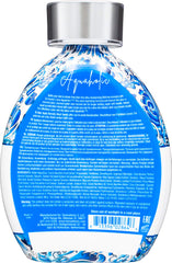 Ed Hardy Aquaholic Coconut Surge lotion texture shows even, streak-free bronze potential.