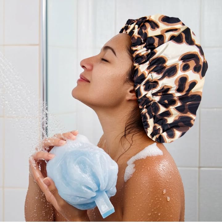 Edoneery Leopard Shower Cap folded for compact storage and hotel travel.