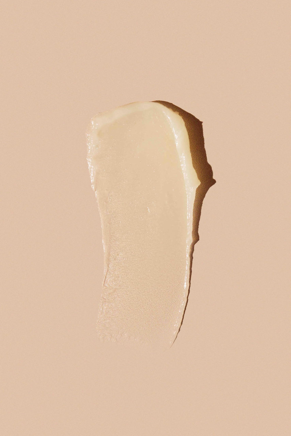 Egyptian Magic hair treatment application for frizz control and shine