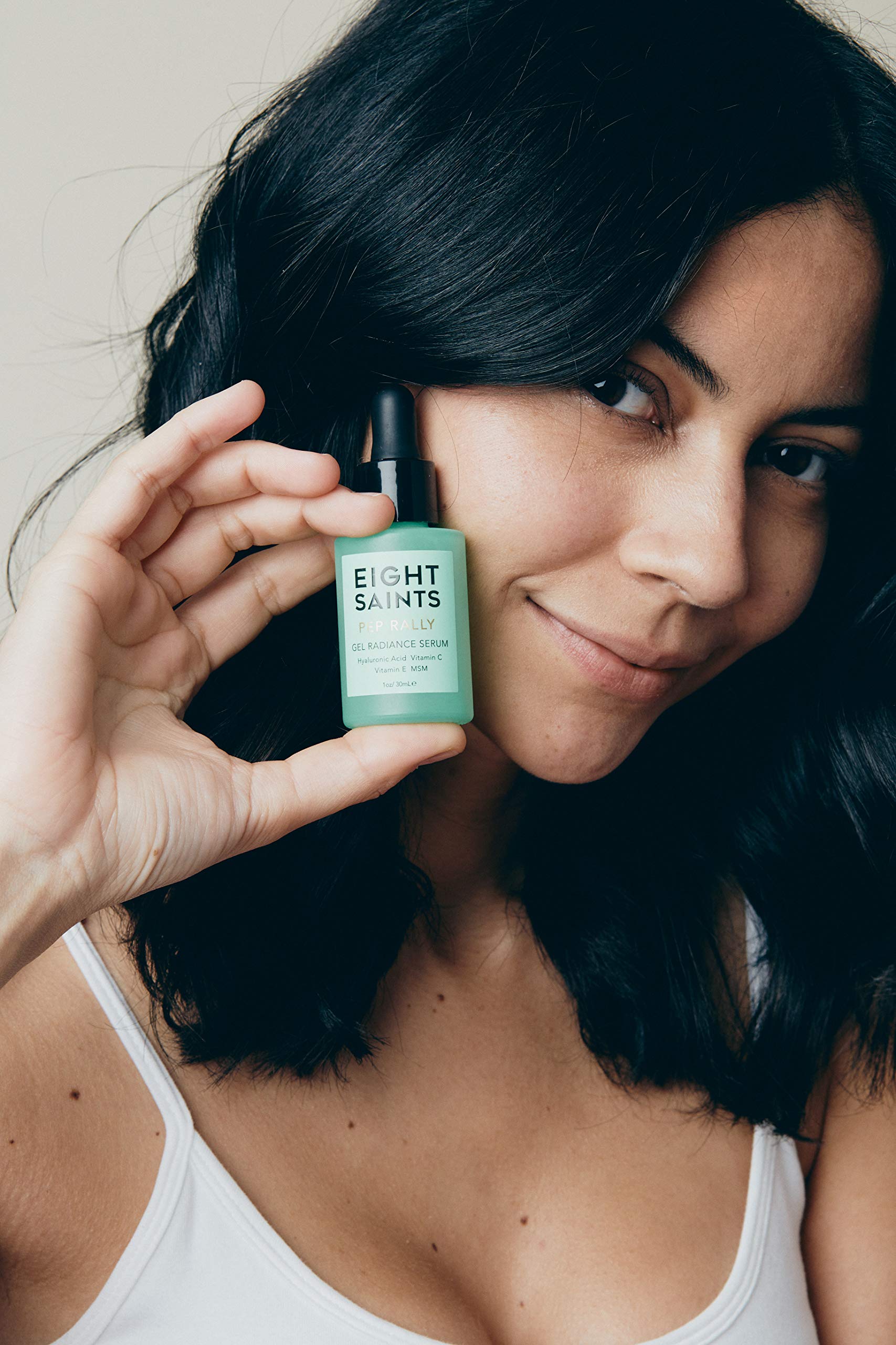 Eight Saints Hyaluronic Serum texture on finger ready for quick absorption.
