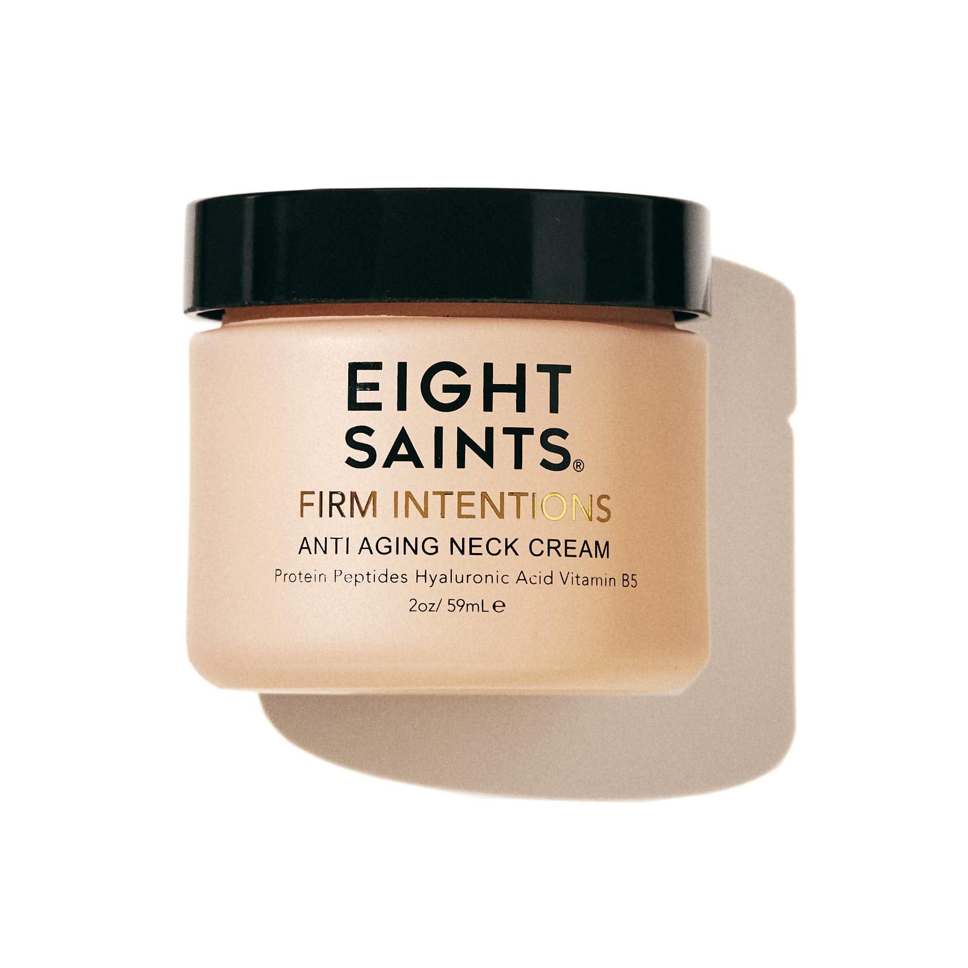 Eight Saints neck cream jar closeup showing rich texture for firming the neck