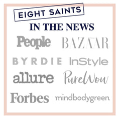 Eight Saints retinol cream spread on face and neck shows quick-absorb texture.