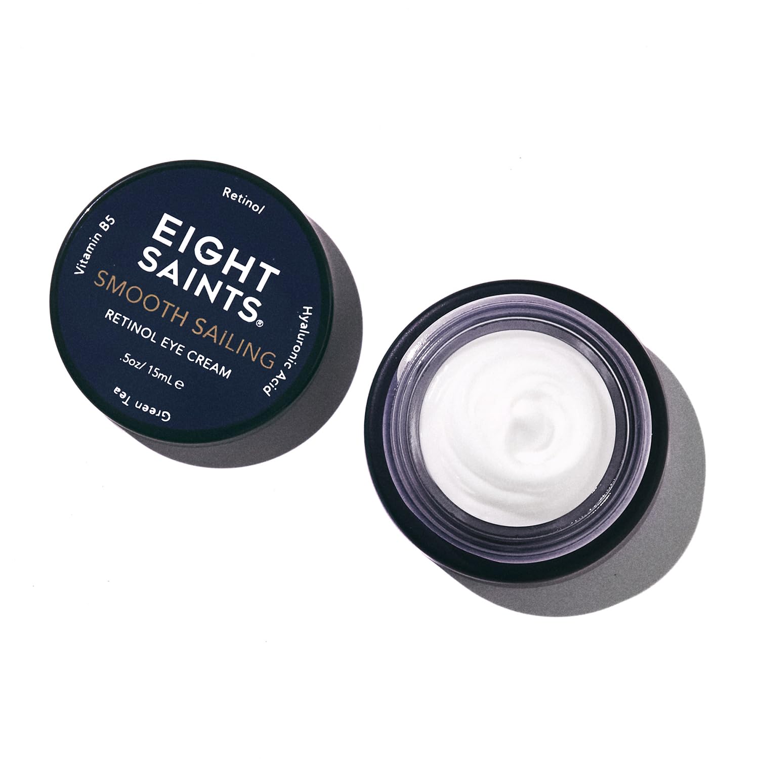 Eight Saints retinol eye cream tube close-up showcases silky texture for smoother under-eye skin.