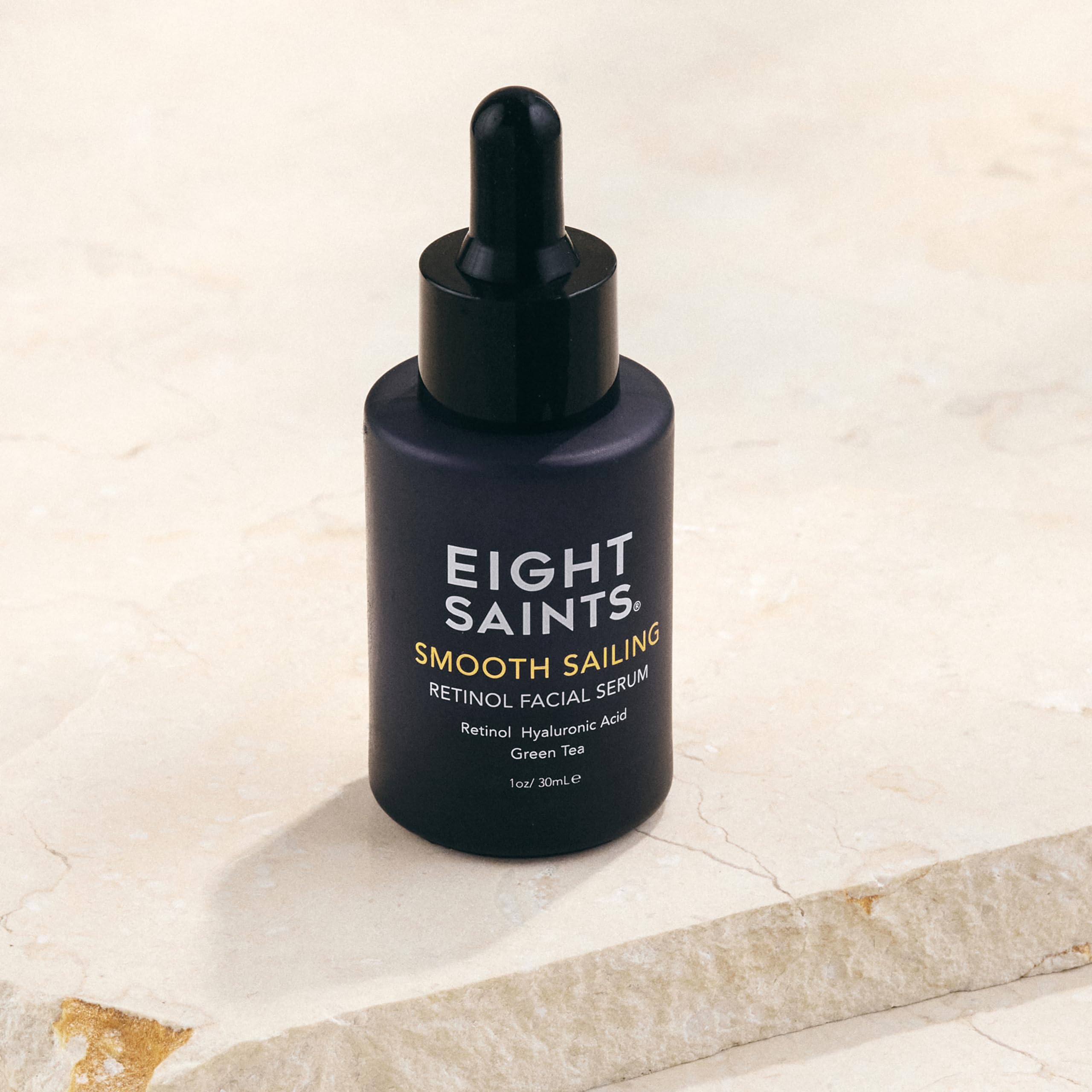 Eight Saints retinol serum on face demonstrates quick-absorbing hydration.