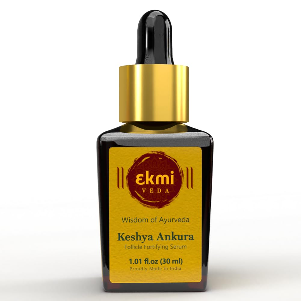EKMIVEDA Hair Growth Serum bottle closeup for scalp nourishment and thickness