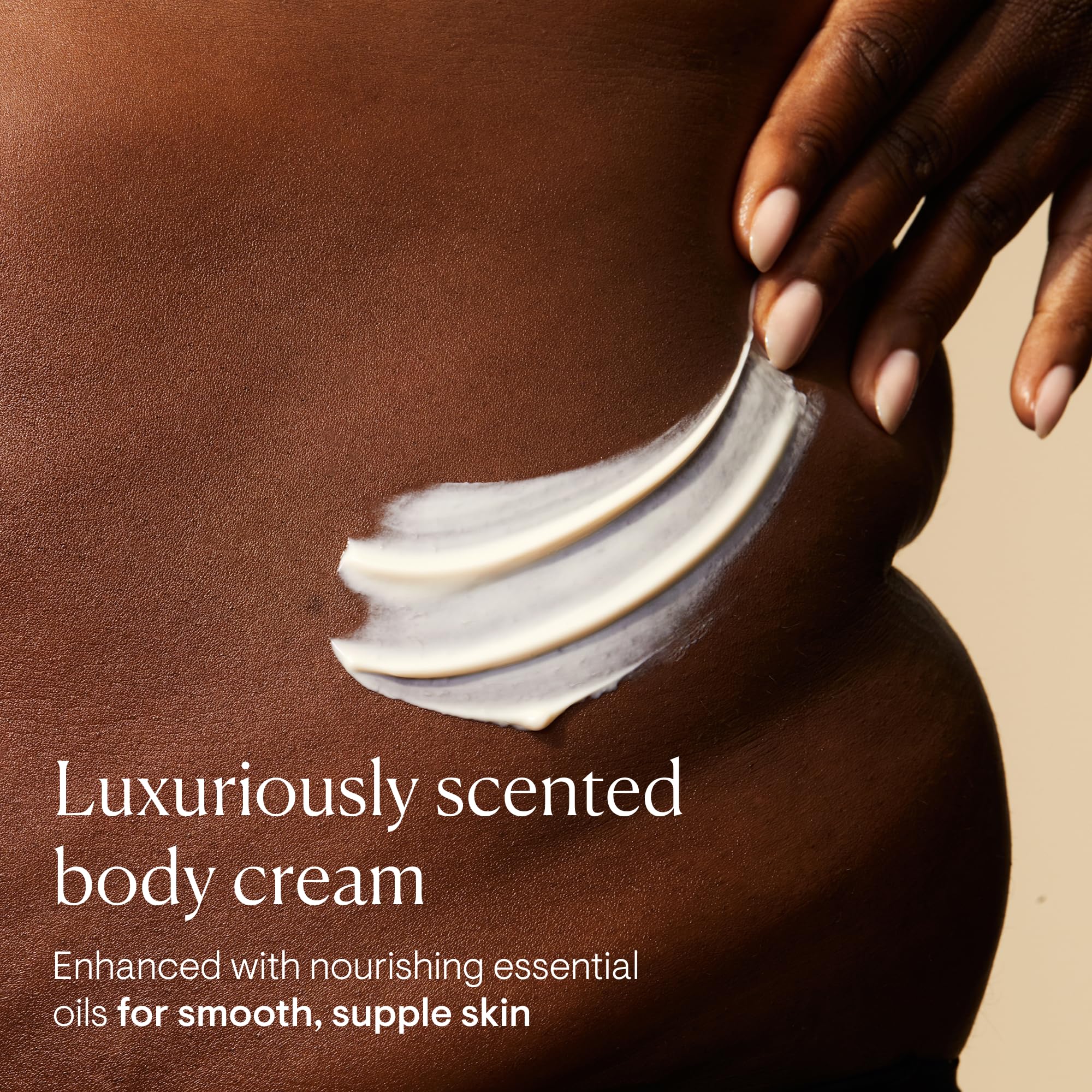 Close-up of ELEMIS Frangipani Monoi cream texture for smooth application.