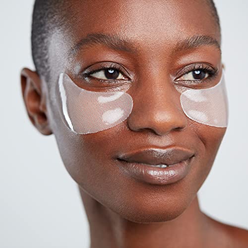 ELEMIS Pro Collagen eye mask being removed, revealing hydrated and tightened under-eye skin.