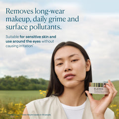 Elemis Pro-Collagen fragrance-free cleansing balm warmed between palms for easy massage.