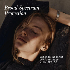 Elemis Pro-Collagen Marine Cream SPF30 on face applying for smooth, refreshed skin.