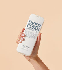 ELEVEN AUSTRALIA Deep Clean Shampoo orange-oil close-up signals citrus cleansing aroma and vitality.