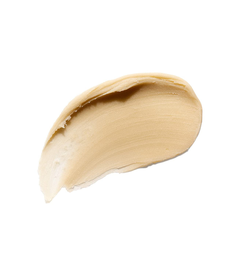 Applying ELEVEN AUSTRALIA Extra Hold clay to damp hair for controlled sleekness.