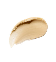 Applying ELEVEN AUSTRALIA Extra Hold clay to damp hair for controlled sleekness.