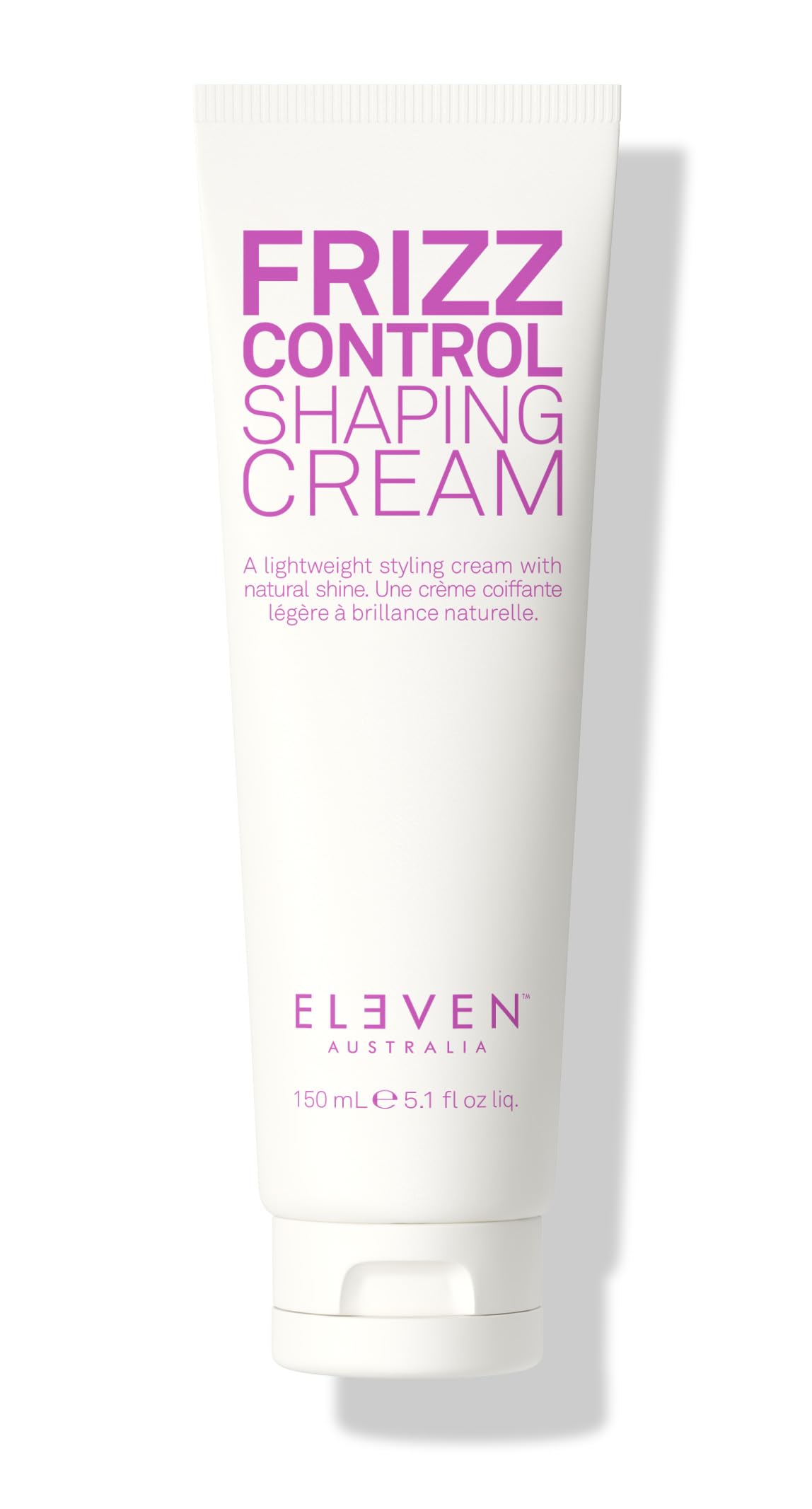 ELEVEN AUSTRALIA Frizz Control Shaping Cream bottle demonstrates easy, frizz-free smoothing for defined curls.