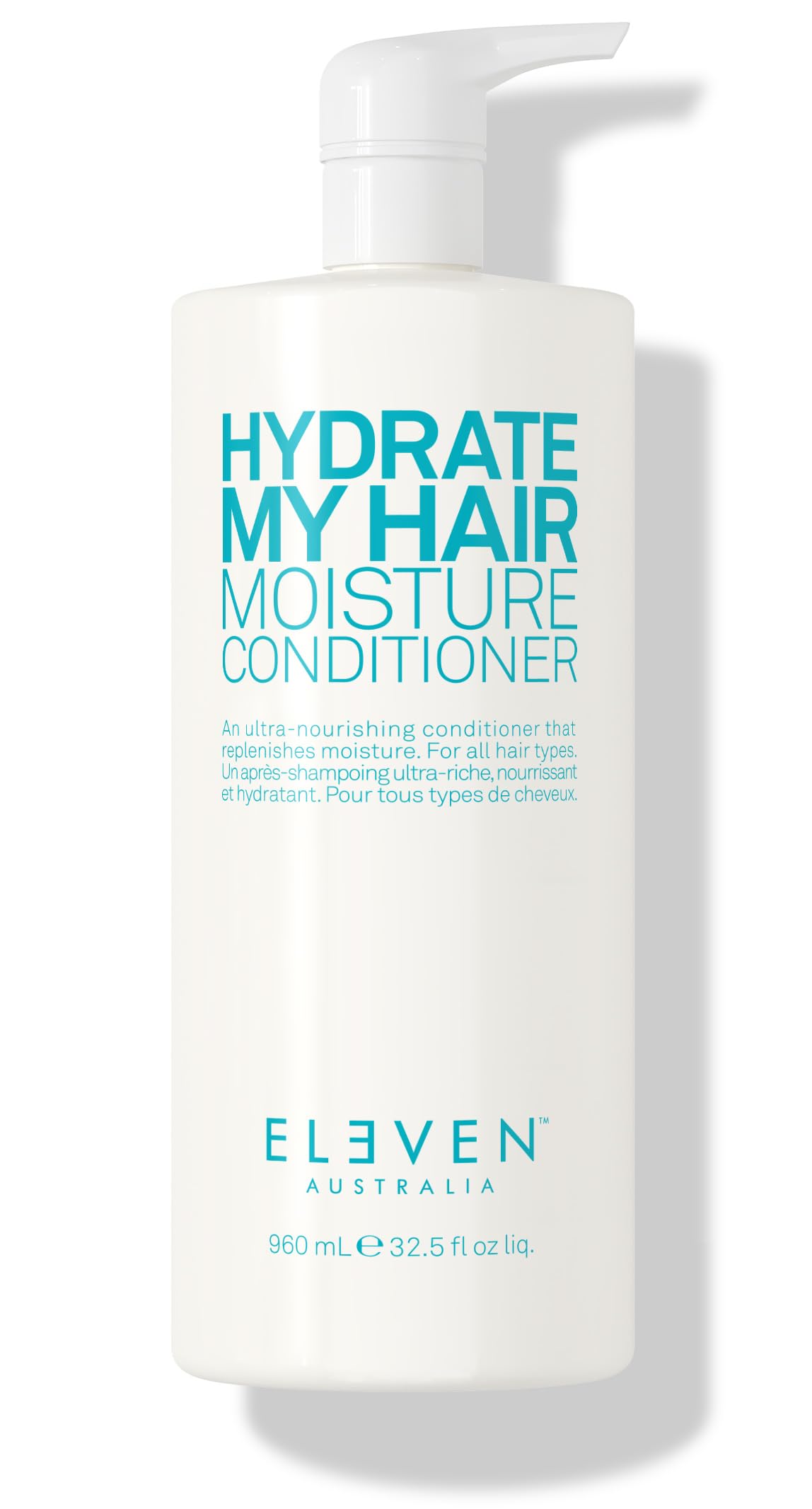 ELEVEN AUSTRALIA Hydrate My Hair conditioner bottle closeup highlights hydration and color-safe formula.
