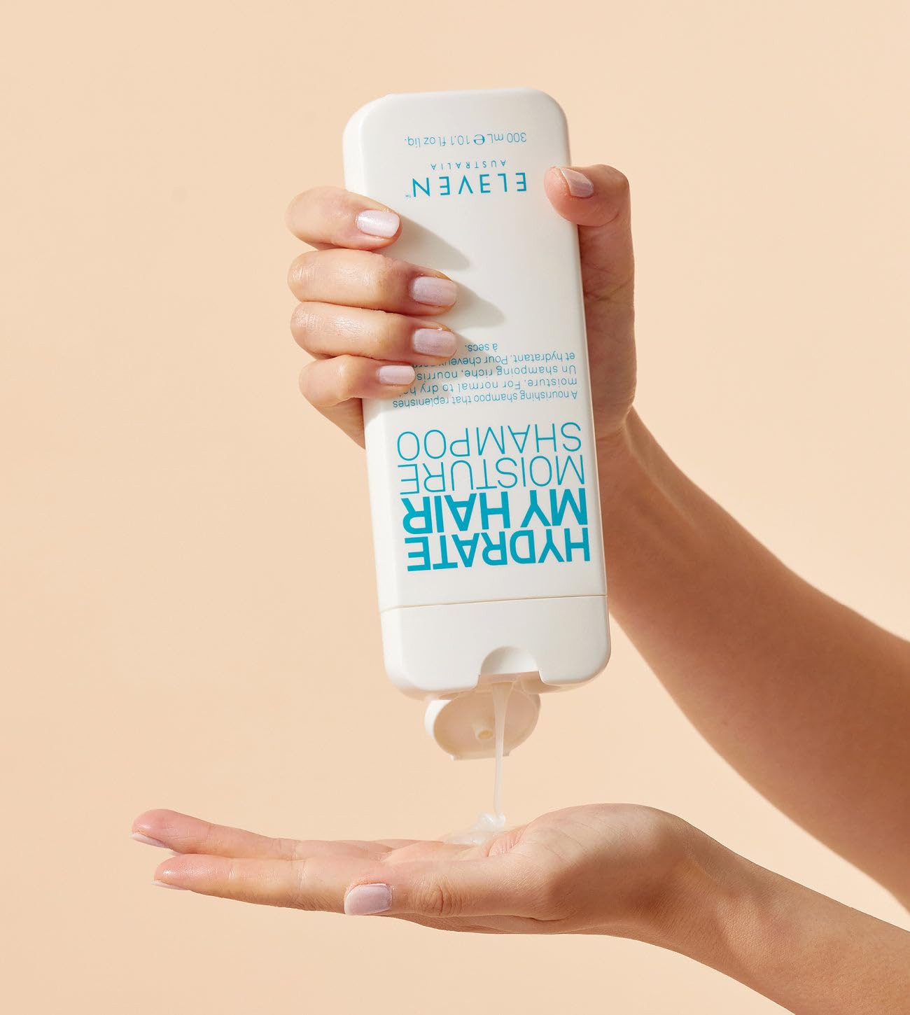 ELEVEN AUSTRALIA Hydrate My Hair Shampoo 32oz bottle highlights long-lasting hydration.
