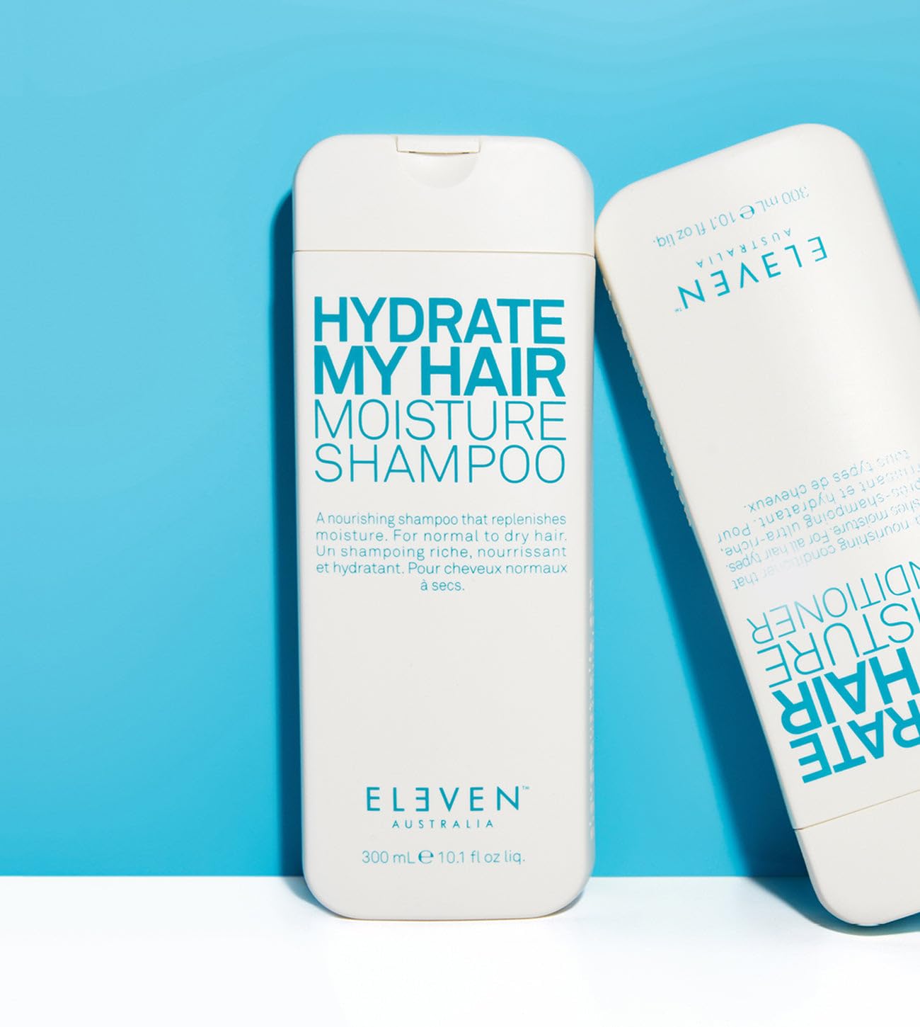 ELEVEN AUSTRALIA Hydrate My Hair Shampoo in a bathroom scene for daily moisture.