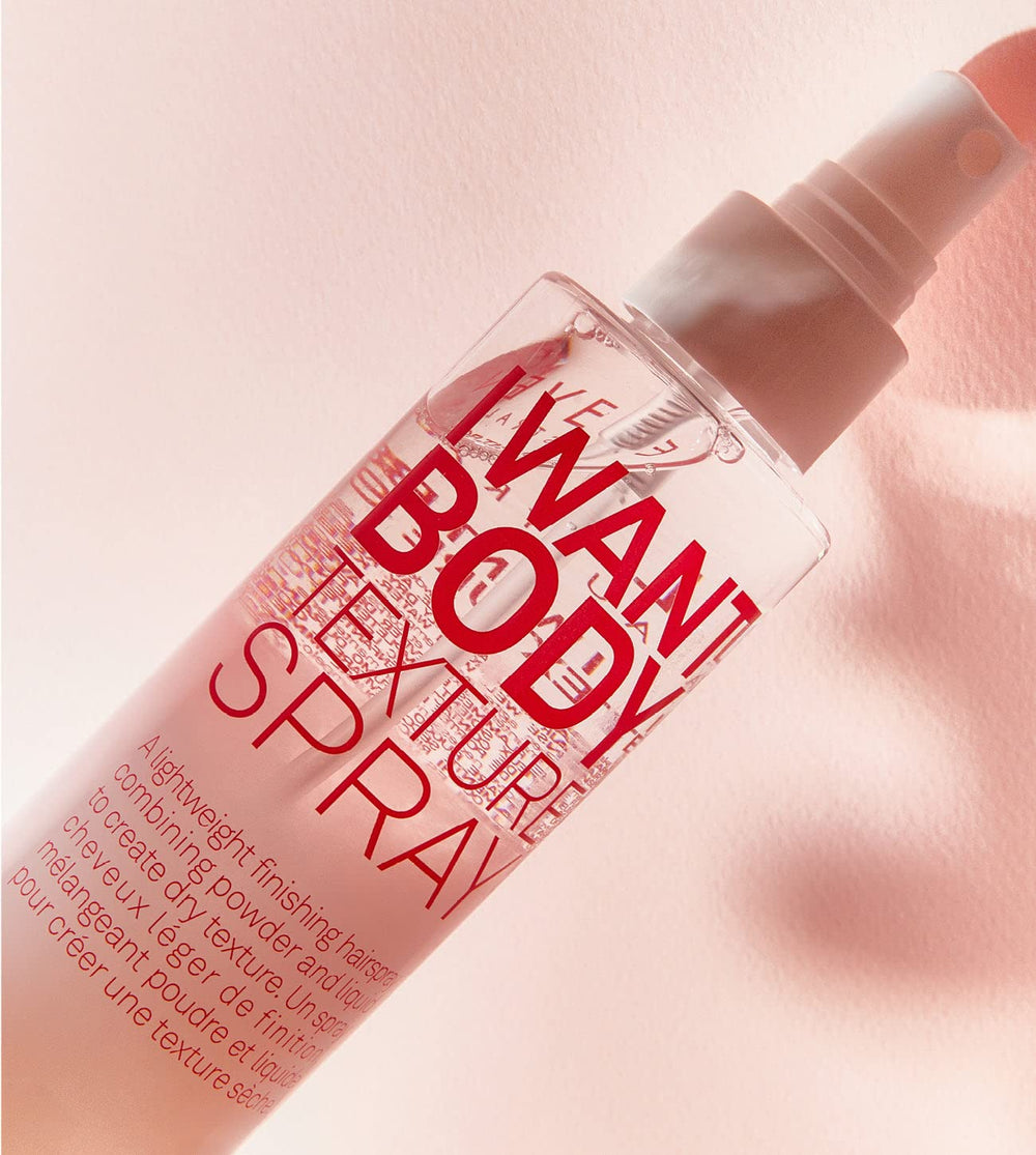 Application of ELEVEN AUSTRALIA I Want Body Texture Spray on hair for root-to-end texture