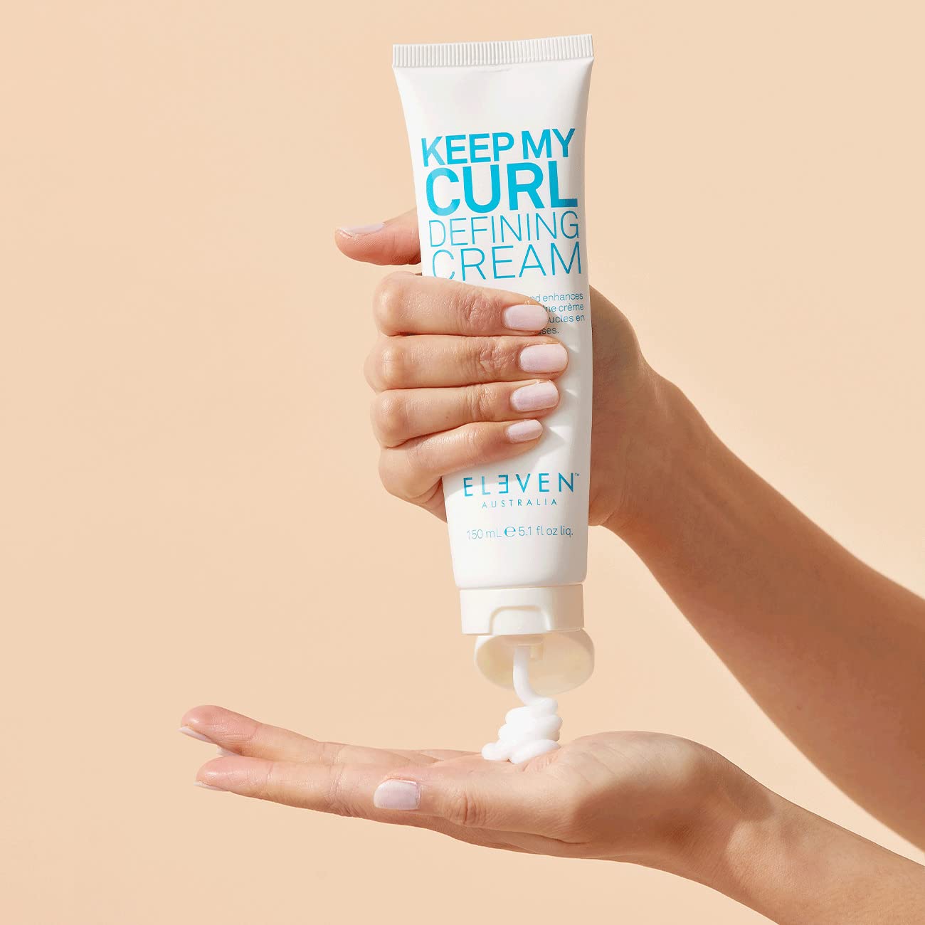 ELEVEN AUSTRALIA Keep My Curl Defining Cream styled curls with bounce and soft hold.