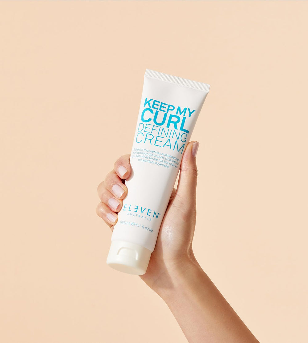 ELEVEN AUSTRALIA Keep My Curl Defining Cream texture swatch shows lightweight conditioning.