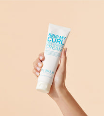 ELEVEN AUSTRALIA Keep My Curl Defining Cream texture swatch shows lightweight conditioning.
