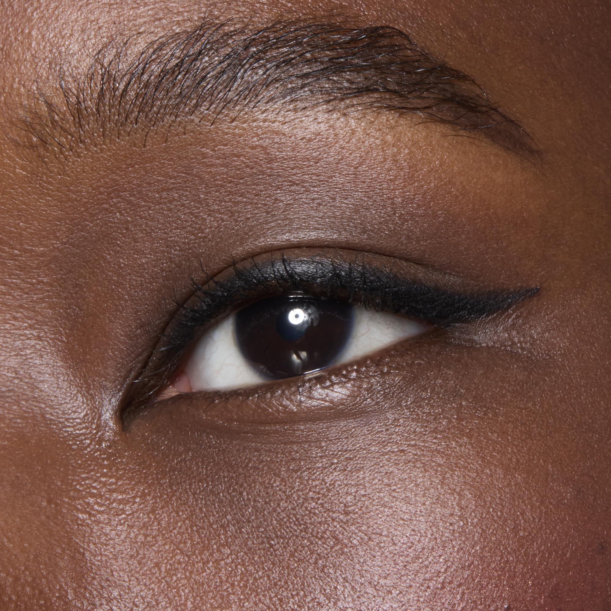 e.l.f. No Budge Retractable Eyeliner creamy pigment for rich black lines.