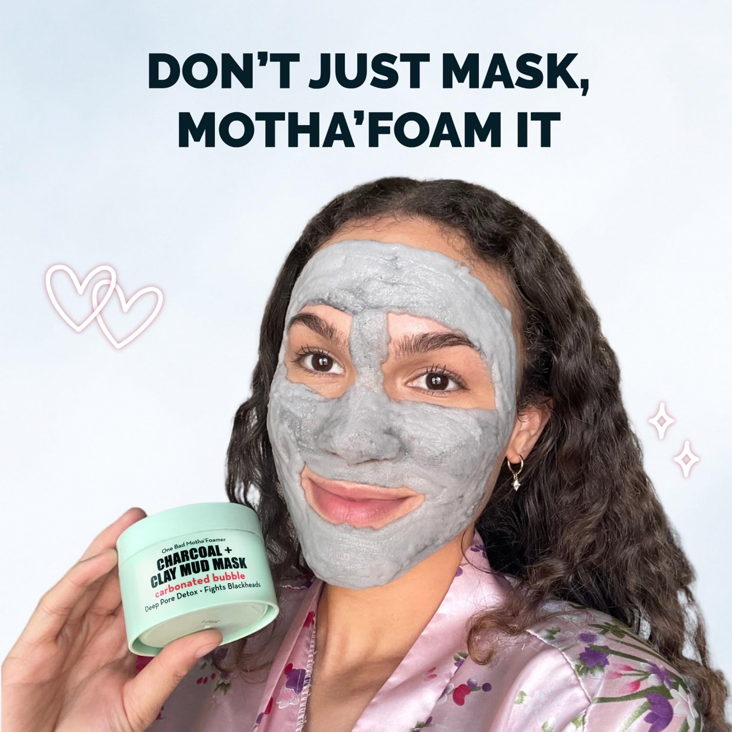 Elizabeth Mott Carbonated Bubble Detox Mask close-up reveals charcoal detox action.