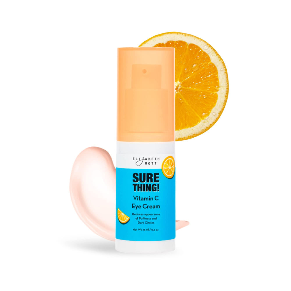 Elizabeth Mott Sure Thing Vitamin C Eye Cream jar closeup shows creamy texture for under-eye hydration.