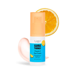 Elizabeth Mott Sure Thing Vitamin C Eye Cream jar closeup shows creamy texture for under-eye hydration.