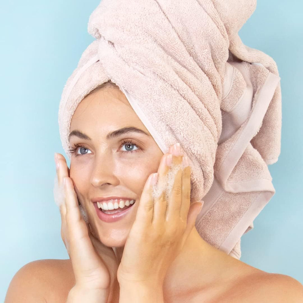 Elizabeth Mott Vitamin C Facial Cleanser applying on skin for daily AM and PM use.