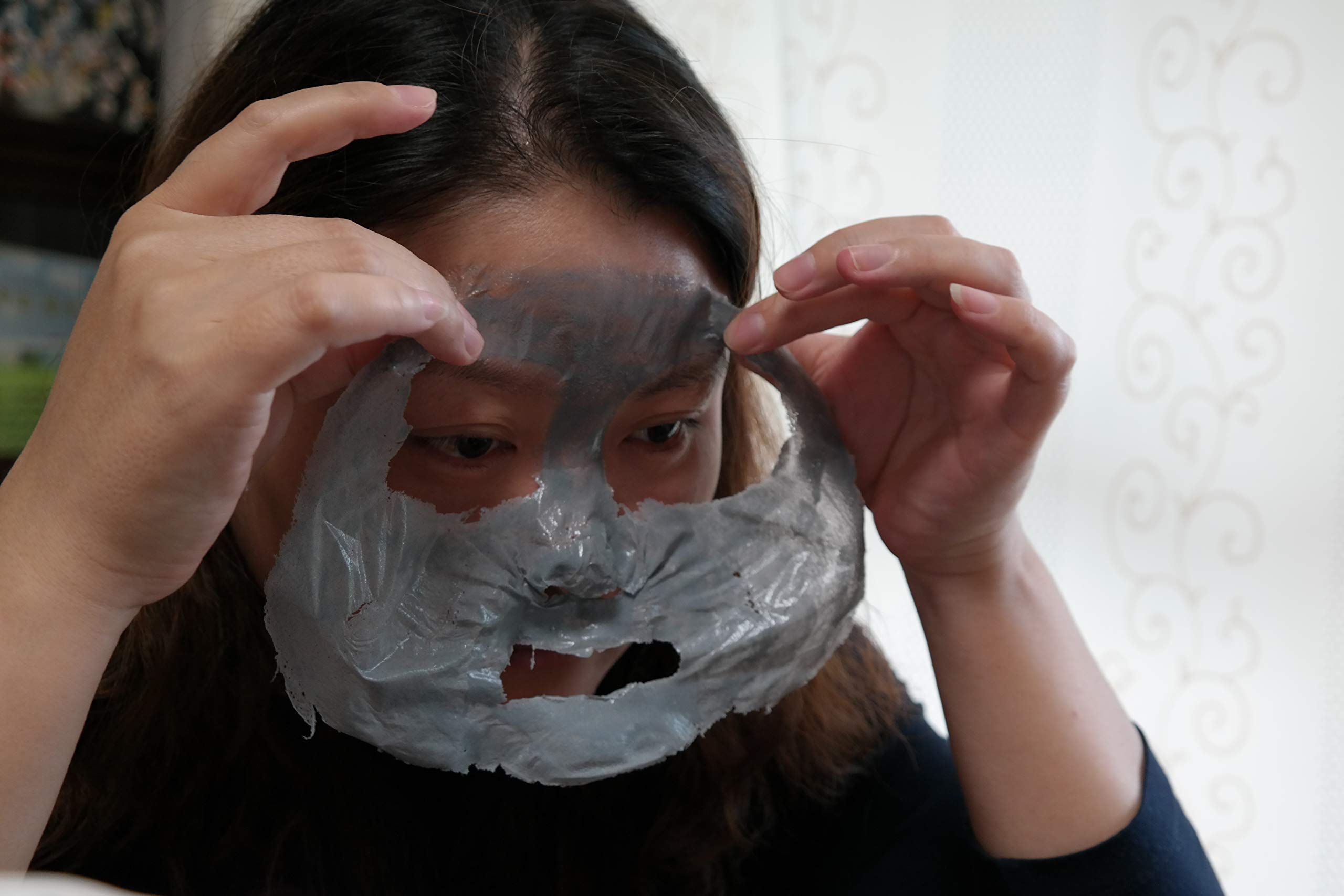 Elizavecca Charcoal pore care demonstrates sebum absorption for smoother skin.