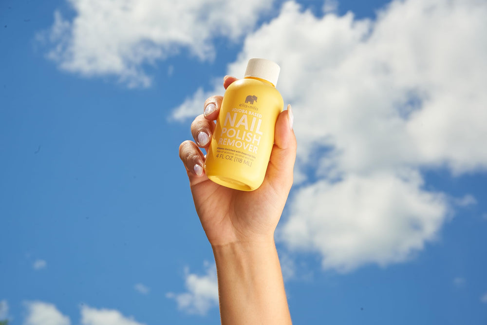 application scene showing gentle polish removal with ella+mila on natural nails.