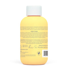 cotton pad with ella+mila remover demonstrates polish removal without drying.
