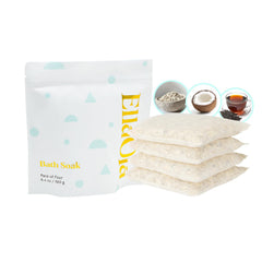 Ellaola Oatmeal Bath Soak tea pack being squeezed releasing nutrients for soothed skin