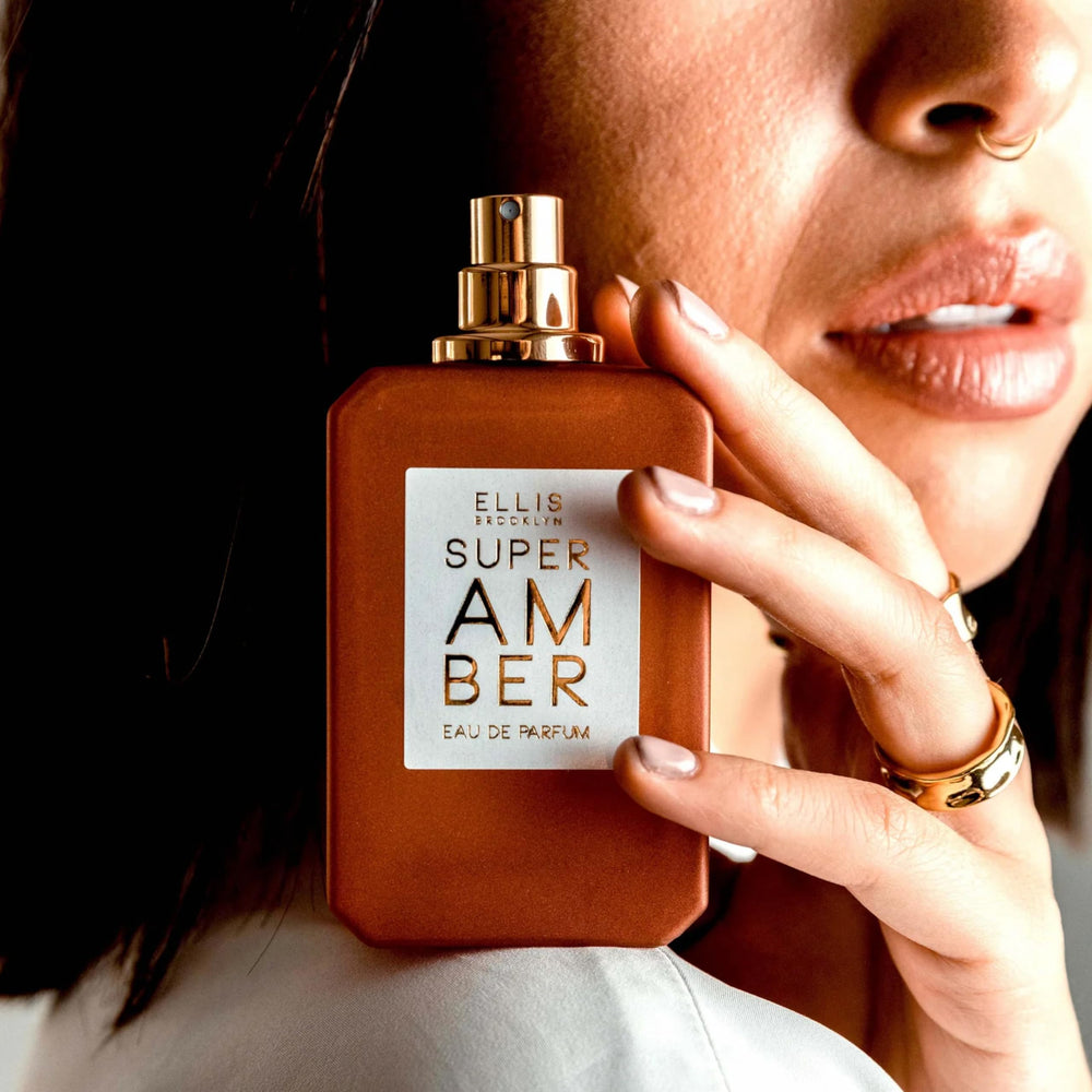 Ellis Brooklyn Super Amber close-up of glass bottle and cap detail.