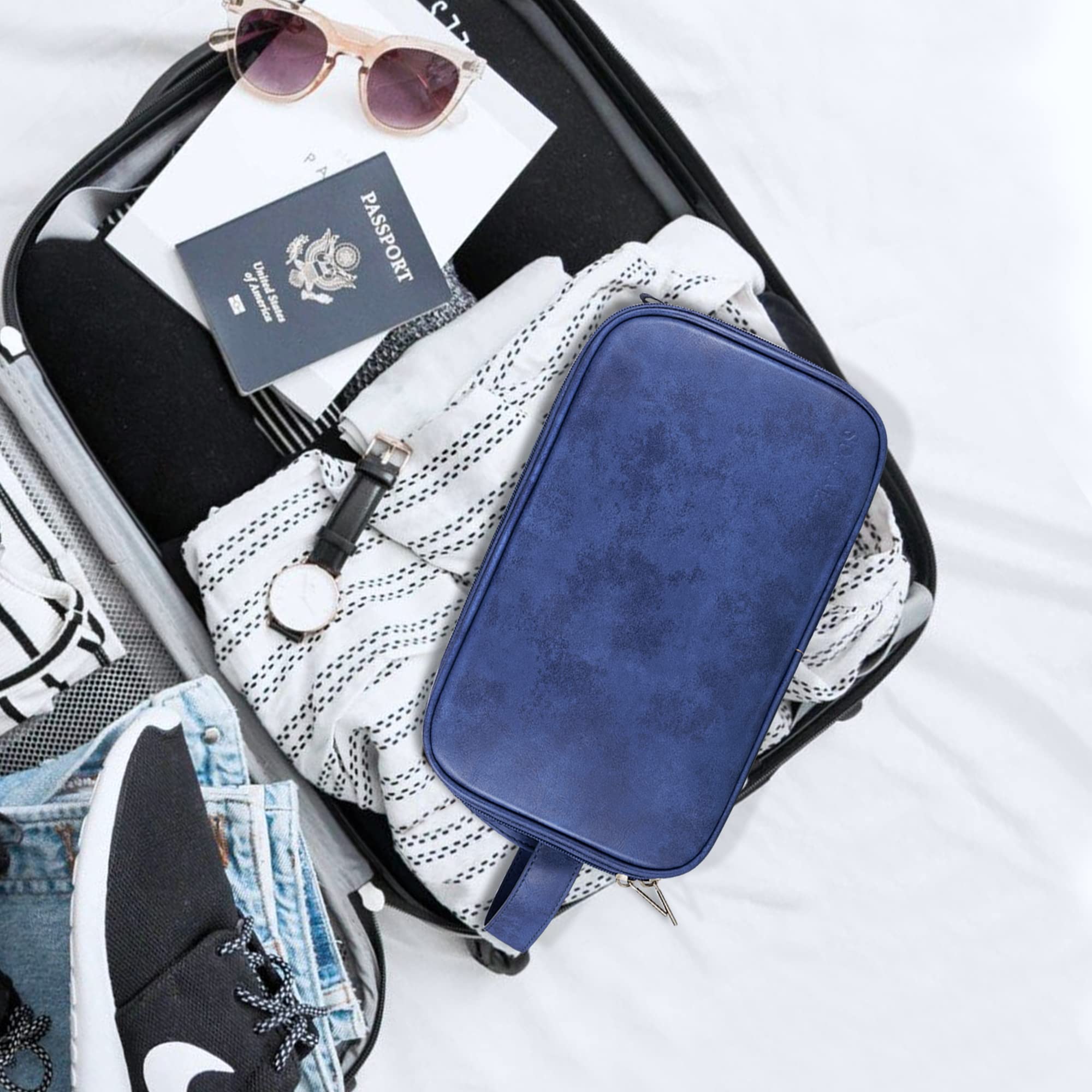 Elviros toiletry bag PU leather closeup highlights premium water-resistant material for damp environments.