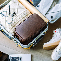 Elviros Dopp Kit shows wet separation for dry and damp items.
