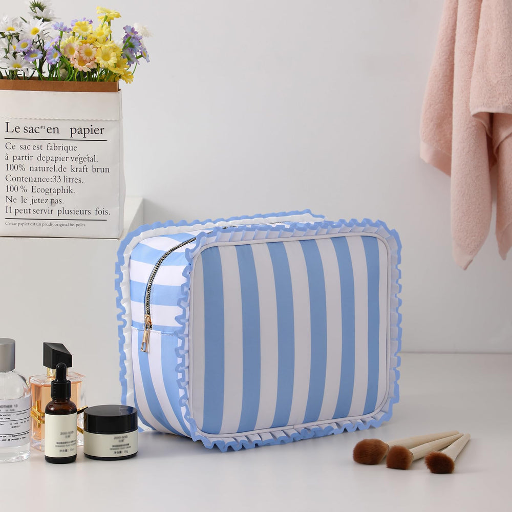 EMBRUNIOICE Blue Stripe Makeup Bag open reveals spacious interior for full-sized cosmetics.