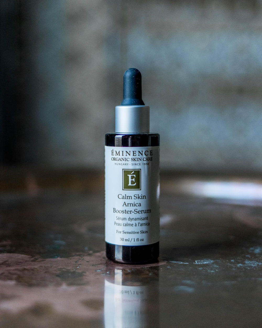 Eminence Arnica Serum texture swirl highlights extra strength blend for calm skin