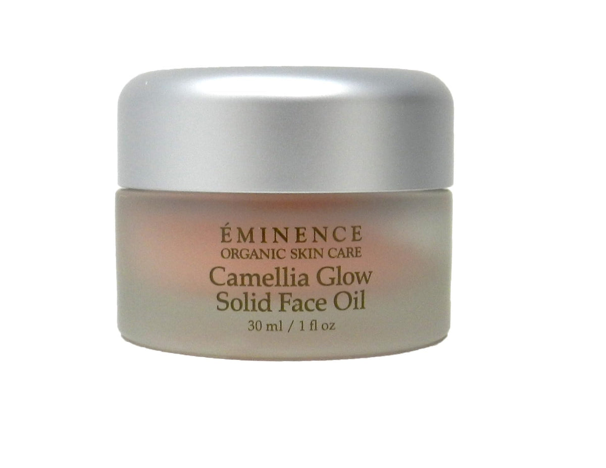 Eminence Camellia Glow solid face oil bottle close-up shows radiant hydration.