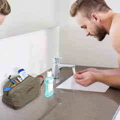 Emissary Dopp Kit dark green side-handle view emphasizes easy carry on the go.