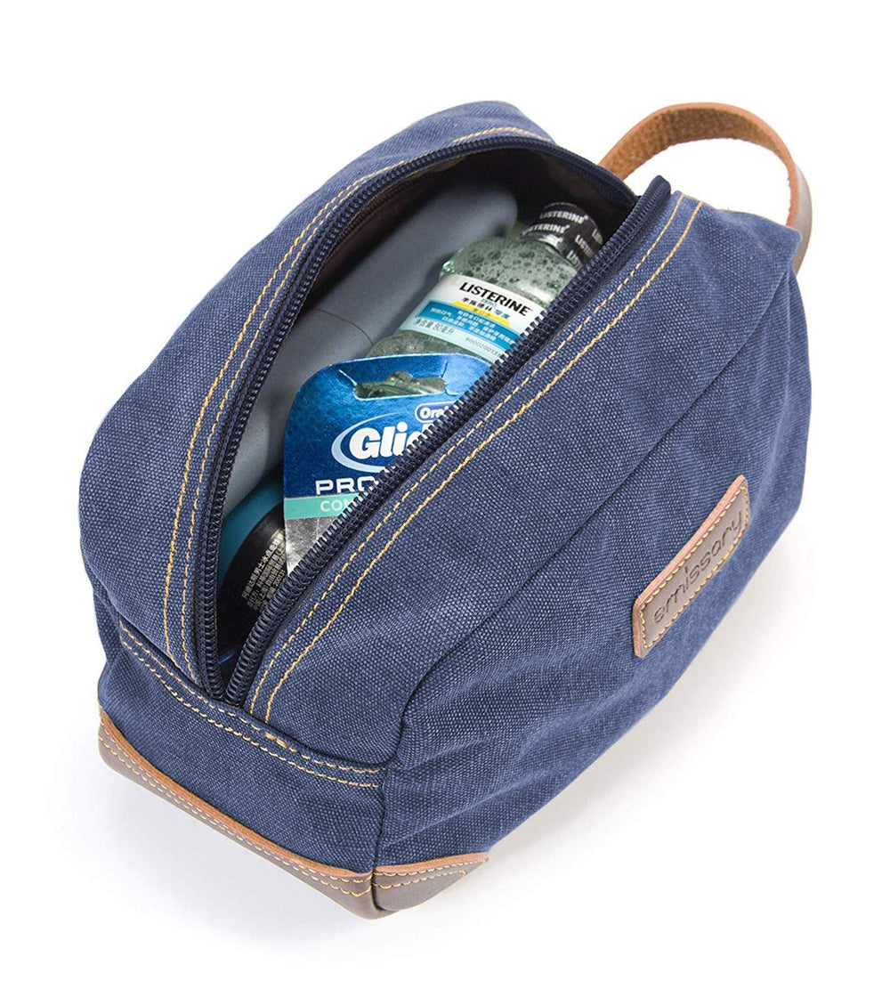 Blue canvas and leather shaving kit ready to store razors and creams