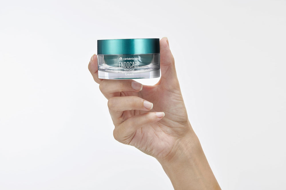 Endocare Tensage Cream being applied signals a daily skincare ritual.