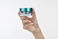 Endocare Tensage Cream being applied signals a daily skincare ritual.