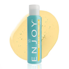 Enjoy Hair & Skin Treatment Oil bottle ready for fast-drying hydration on hair and skin