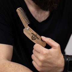 Enjoy The Wood folding beard comb in-use for beard moustache shaping