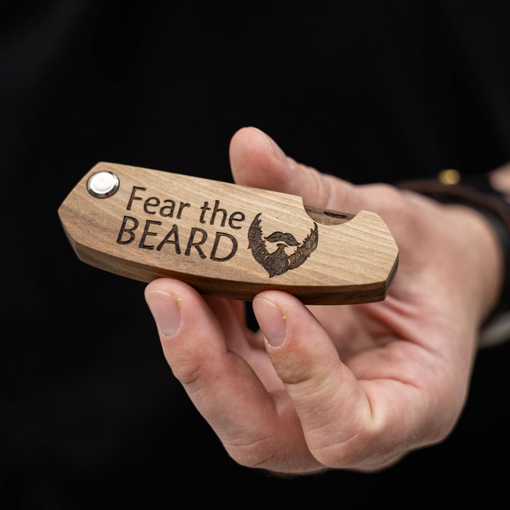 Enjoy The Wood handmade beard comb emphasizes durable walnut wood.