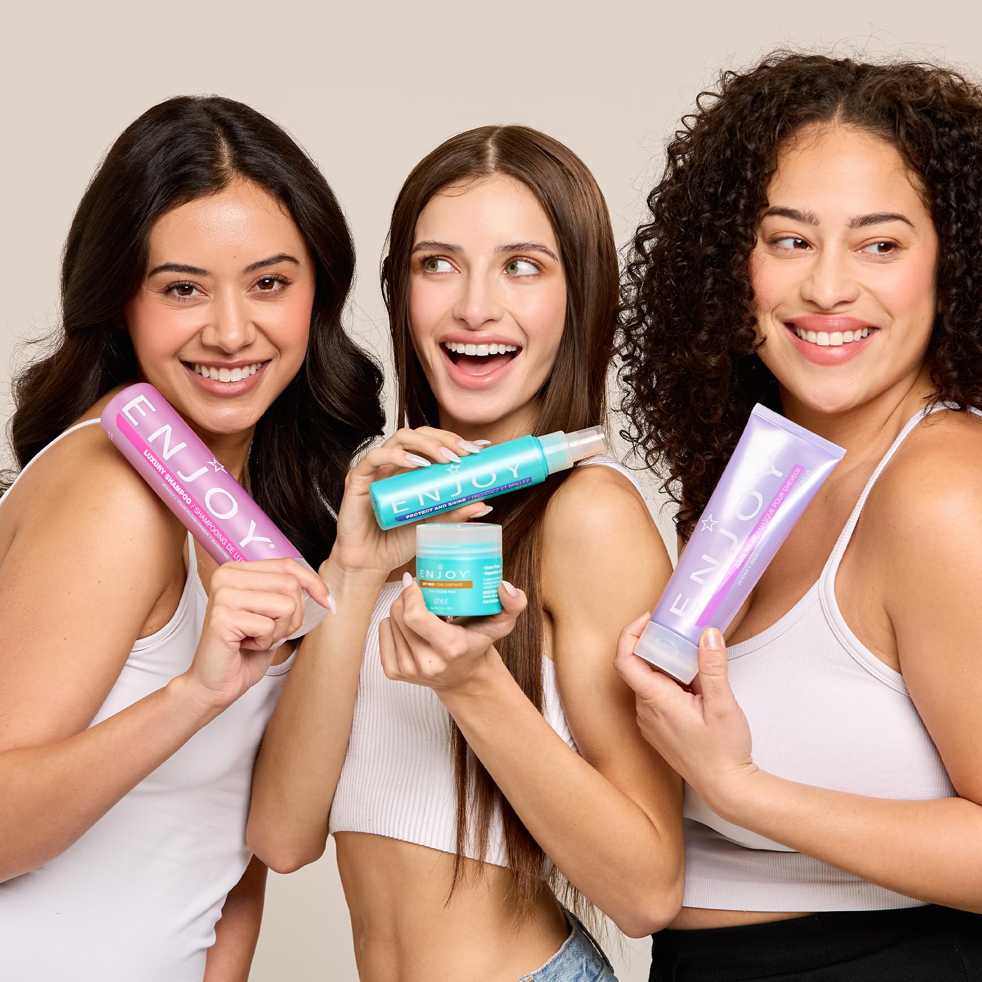 ENJOY Volumizing Mousse being applied to damp hair for root lift