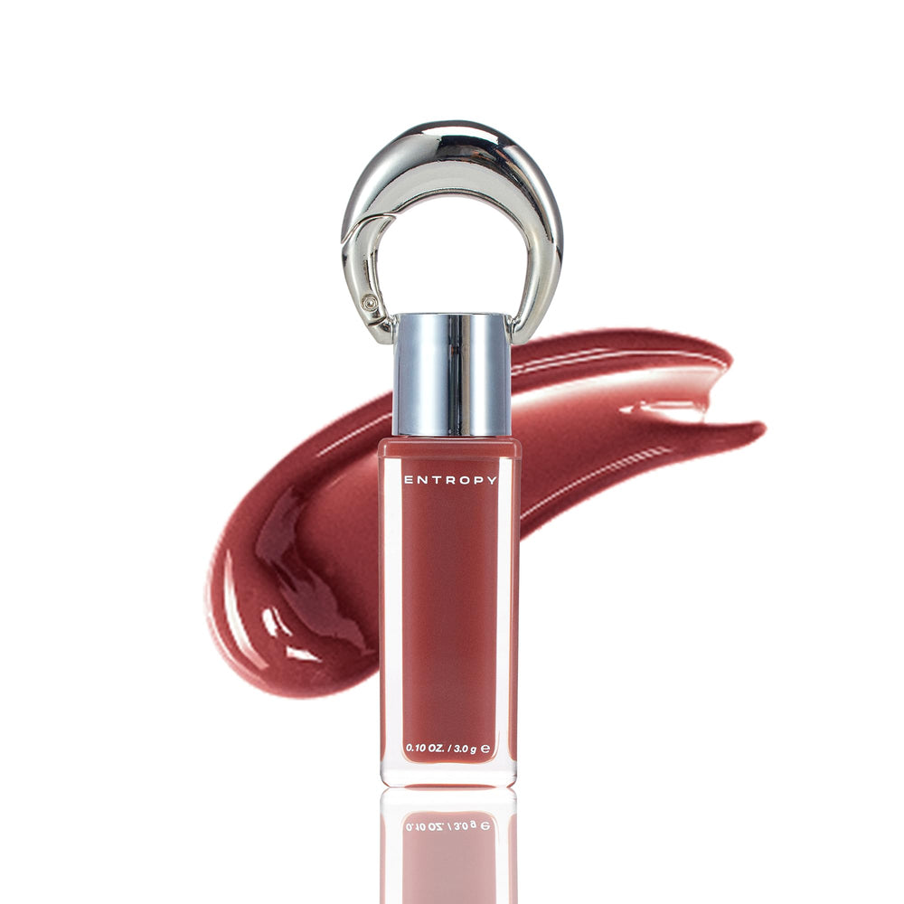 ENTROPY MAKE UP 2-in-1 charm gloss amber swatch for lips and cheeks with radiant color